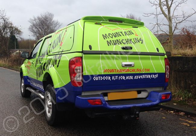 Nissan Navara fully vinyl wrapped for Mountain Munchkins in a printed vehicle wrap by Totally Dynamic Manchester