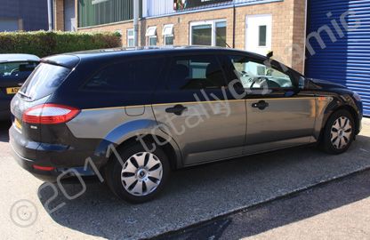 Ford Hearse with sides wrapped in metallic silver and gold stripe by Totally Dynamic Norfolk