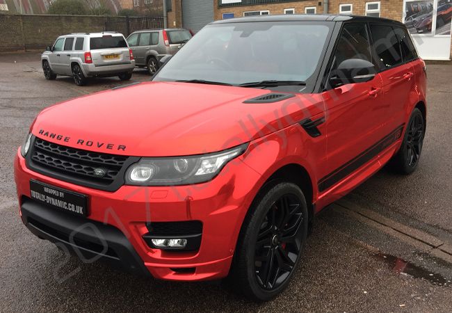 Range Rover Sport Autobiography with a red chrome vinyl car wrap