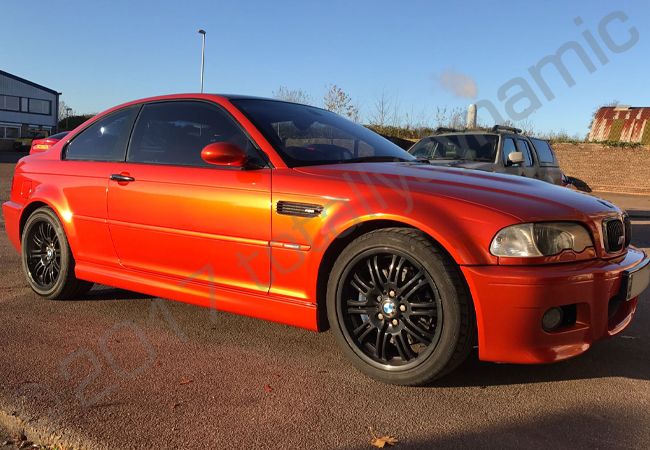 BMW M3 fully vinyl wrapped in gloss burnt orange