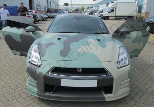 Nissan GTR vinyl wrapped in an arctic camo style car wrap