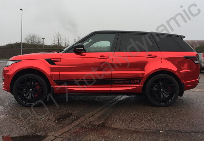 Range Rover Sport Autobiography with a red chrome vinyl car wrap