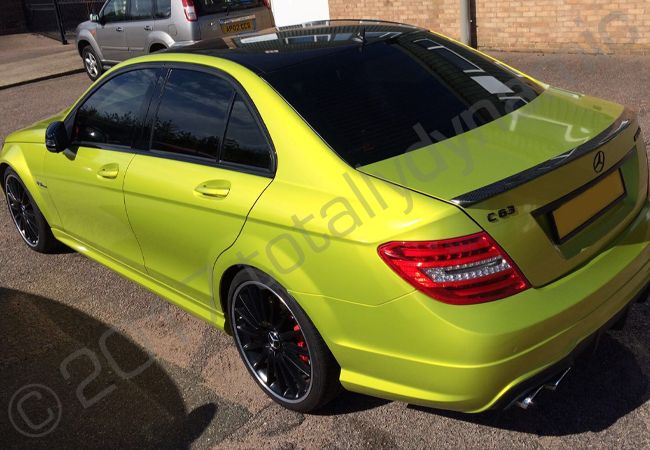 Mercedes C63 AMG vinyl wrapped in electric lime green