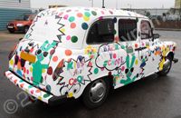 London Taxi with printed vehicle wrap for London Fashion Week by Totally Dynamic North London