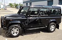 Land Rover Defender wrapped in printed yellow design by Totally Dynamic South London