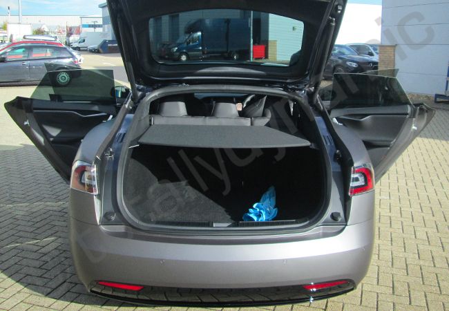 Tesla Model S fully vinyl wrapped in dark matt metallic grey