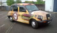 Taxi - designed and wrapped by Totally Dynamic Central Scotland