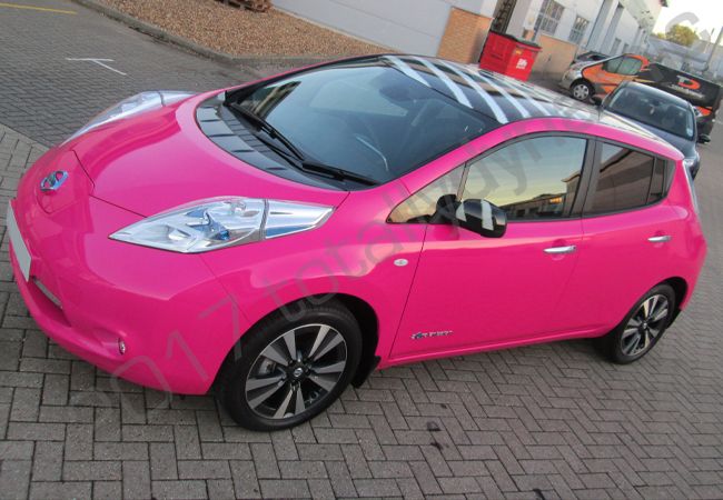 Nissan Leaf fully wrapped in a colour-matched pink vinyl car wrap