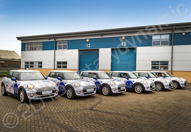 MINI Fleet fully vinyl wrapped for Breckon & Breckon in a printed vehicle wrap design by Totally Dynamic North & South London