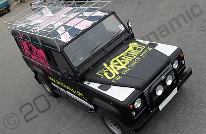 Defender Land Rover 110 LWB wrapped matte black and printed by Totally Dynamic North London