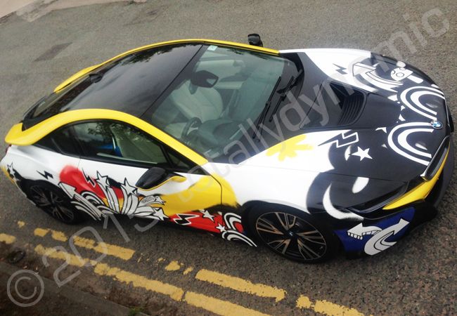 BMW i8 fully vinyl wrapped for Cosatto in a printed vehicle wrap design by Totally Dynamic Manchester