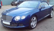 Bentley GTC fully vinyl wrapped in gloss dark blue