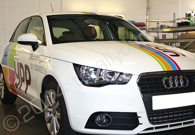 Audi A1 fully wrapped in a printed vinyl vehicle wrap design by Totally Dynamic Leeds