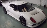 Noble M12 wrapped white with white carbon fibre by Totally Dynamic Lincoln