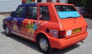 Metrocab Taxi - designed and wrapped by Totally Dynamic Norwich
