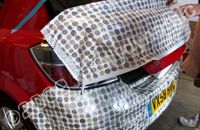 Vauxhall wrapped in real coins by Totally Dynamic North London