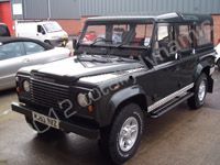 Land Rover Defender fleet wrapped in gloss white vinyl by Totally Dynamic Lincolnshire