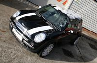 Mini with a wrapped camo roof and wing mirrors by Totally Dynamic Norwich