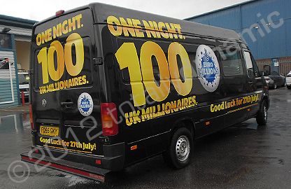 VW LT van fully wrapped in gloss black vinyl with print and cut graphics overlaid by Totally Dynamic North London