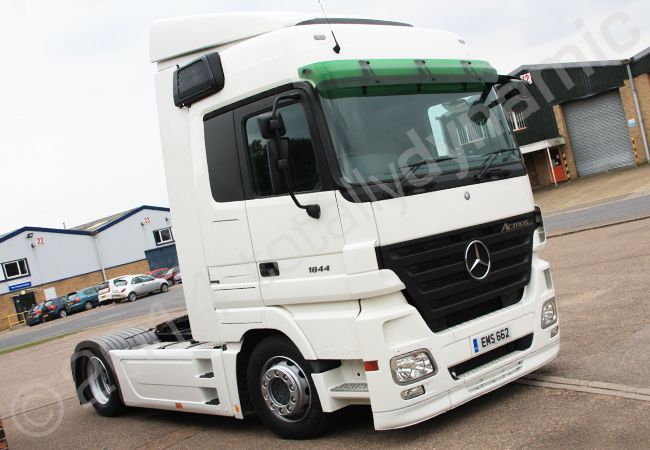 Mercedes Actros tractor unit fully vinyl wrapped in gloss black wrapping film by Totally Dynamic Norfolk