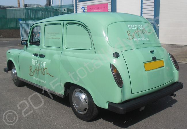 London Taxi fully wrapped in a printed vinyl taxi wrap for Bicester Village by Totally Dynamic North London