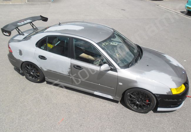 Saab 9-3 fully vinyl wrapped in a printed car wrap design for CEX by Totally Dynamic North London