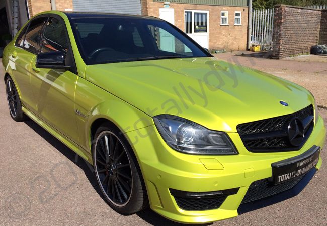 Mercedes C63 AMG vinyl wrapped in electric lime green