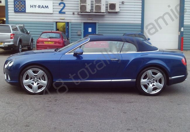Bentley GTC fully vinyl wrapped in gloss dark blue