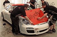 Porsche GT3 RS Carrera Cup race car wrapped gloss red by Totally Dynamic North London