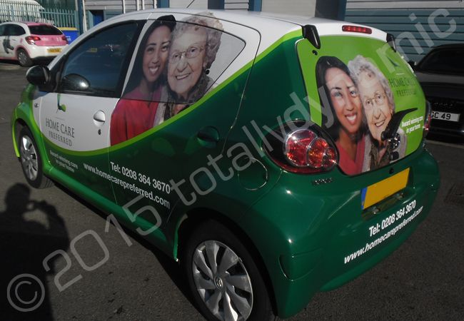 Toyota Aygo fully vinyl wrapped for Home Care Preferred in a printed vehicle wrap design by Totally Dynamic North London