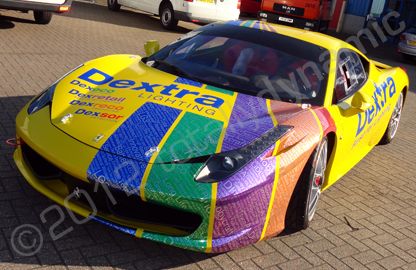 Ferrari 458 wrapped in yellow with printed chrome graphics by Totally Dynamic Southampton