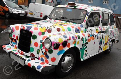 London Taxi with printed vehicle wrap for London Fashion Week by Totally Dynamic North London