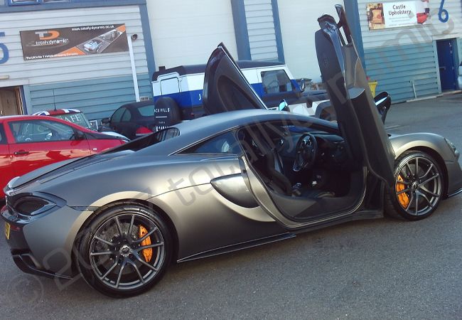 McLaren 570S wrapped in a matt metallic grey vinyl car wrap