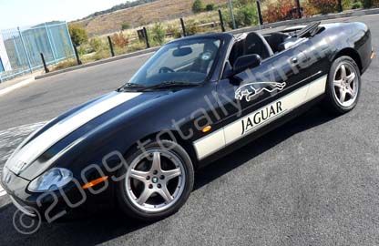 Jaguar XK8 wrapped gloss black by Totally Dynamic North London