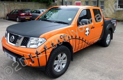 Nissan Navara wrapped gloss orange, matt black with graphics by Totally Dynamic Leeds / Bradford