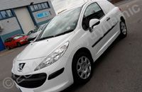Peugeot 207 van wrapped green with cut graphics by Totally Dynamic North London