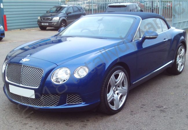 Bentley GTC fully vinyl wrapped in gloss dark blue