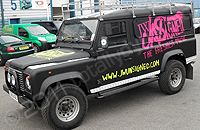Defender Land Rover 110 LWB wrapped matte black and printed by Totally Dynamic North London