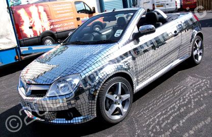 Tigra covered in real mirrors by Totally Dynamic North London