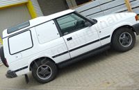 Land Rover Discovery wrapped in gloss white vinyl by Totally Dynamic Milton Keynes