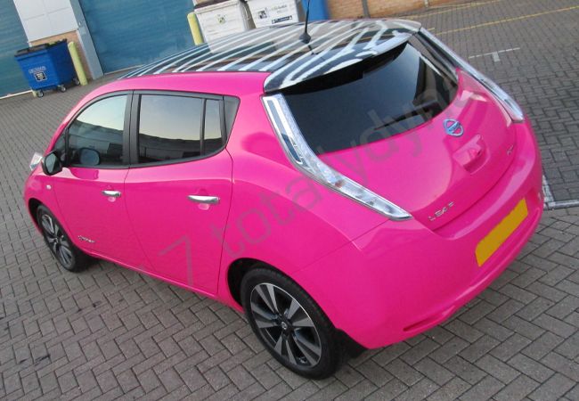 Nissan Leaf fully wrapped in a colour-matched pink vinyl car wrap