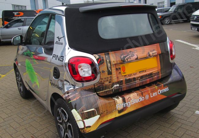 Smart car in a chrome vinyl car wrap for The Pro Golf Shop Jersey