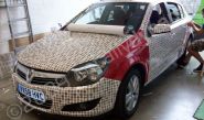 Vauxhall wrapped in real coins by Totally Dynamic North London