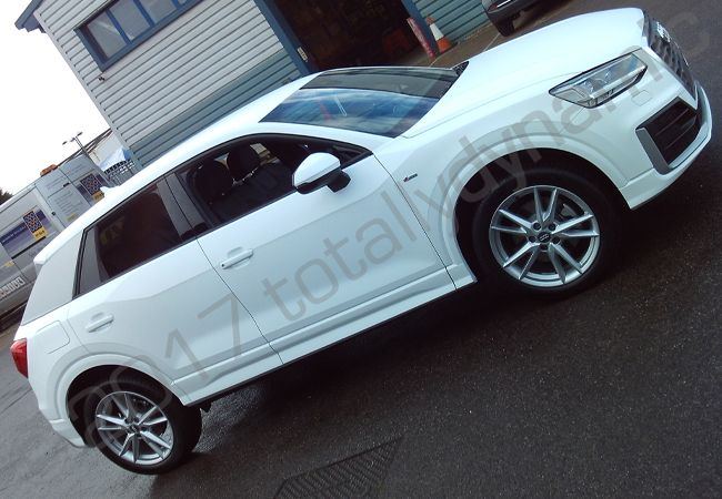 Audi Q2 fully vinyl wrapped in a matt white car wrap