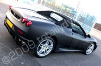 Ferrari wrapped matt black by Totally Dynamic North London