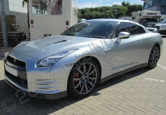 Nissan GTR vinyl wrapped in an arctic camo style car wrap