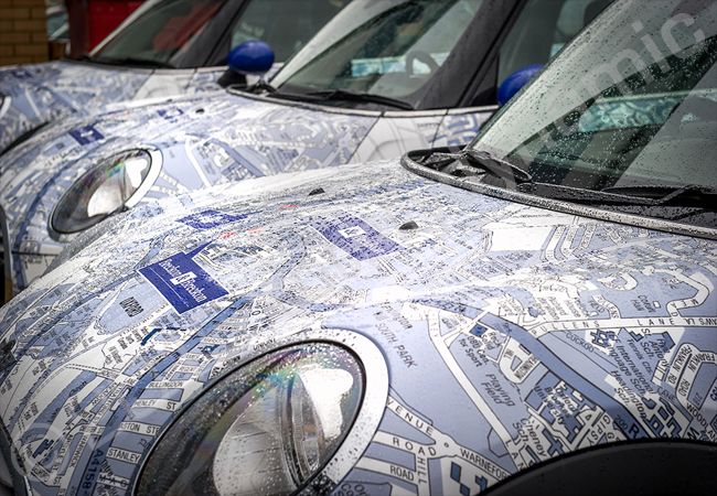 MINI Fleet fully vinyl wrapped for Breckon & Breckon in a printed vehicle wrap design by Totally Dynamic North & South London
