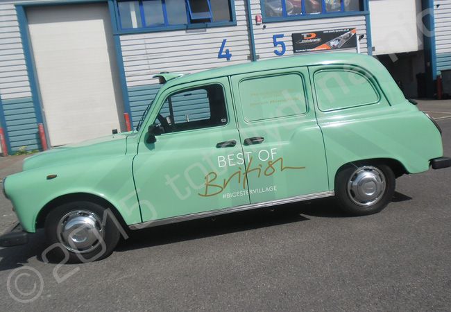 London Taxi fully wrapped in a printed vinyl taxi wrap for Bicester Village by Totally Dynamic North London