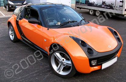 Smart Roadster wrapped orange by Totally Dynamic North London