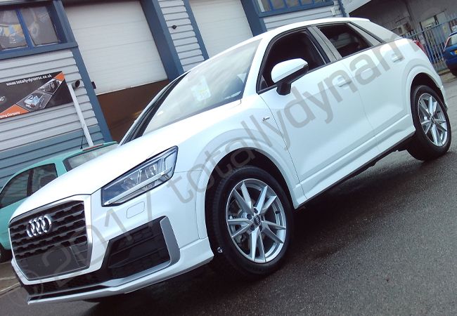 Audi Q2 fully vinyl wrapped in a matt white car wrap